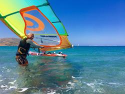 Crete windsurfing holiday. Palekastro Bay windsurf beach launch.